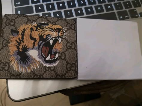 lion wallet gucci|large Gucci wallet.